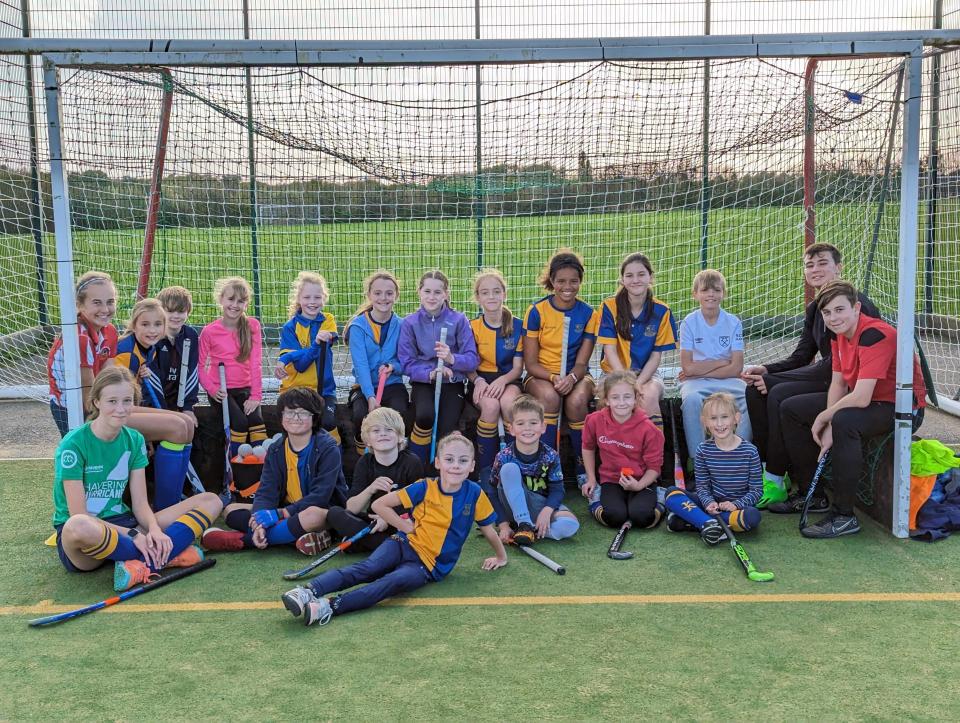 Hockey team group photo outdoors