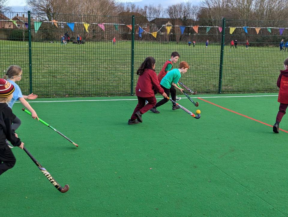 Hockey team group photo outdoors